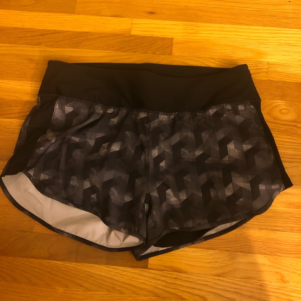 Athletic black shorts with geometric pattern